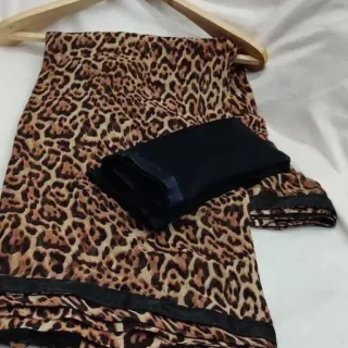 jxj8m_1024.webp Roar with Elegance: Tiger Print Saree