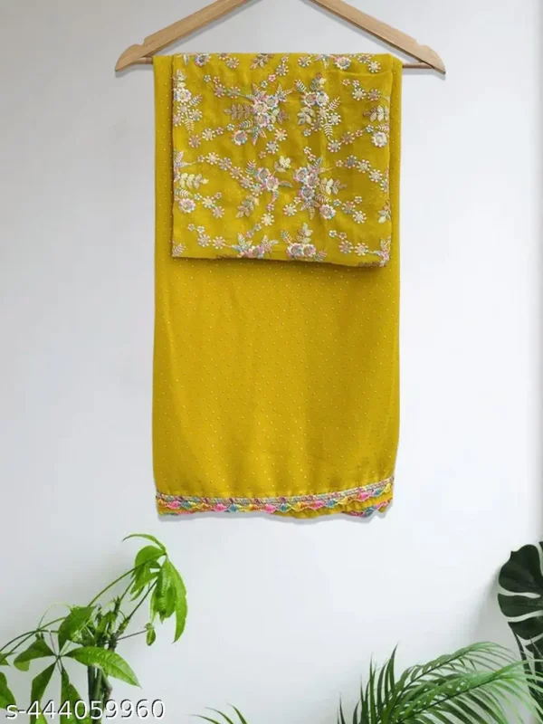 xwlkq_1024.webp Yellow Georgette Saree: Party Wear Elegance