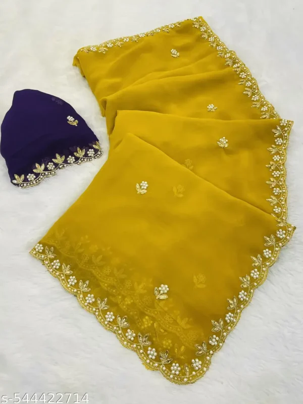 yucfl_1024.webp Embroidered Georgette Saree & Blouse Set